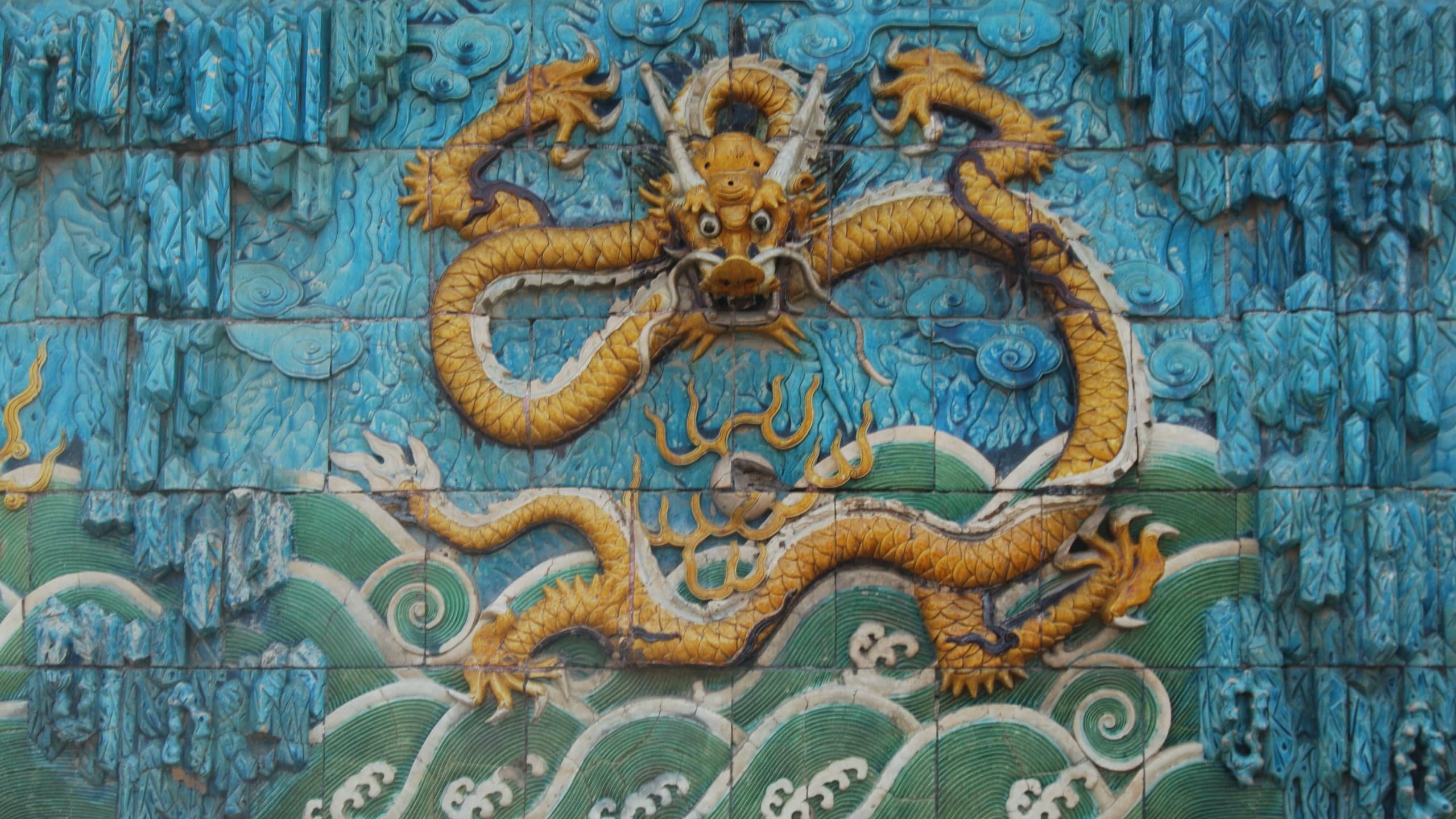 One of the dragons on the Nine Dragon Screen Wall of the Forbidden City in Beijing
